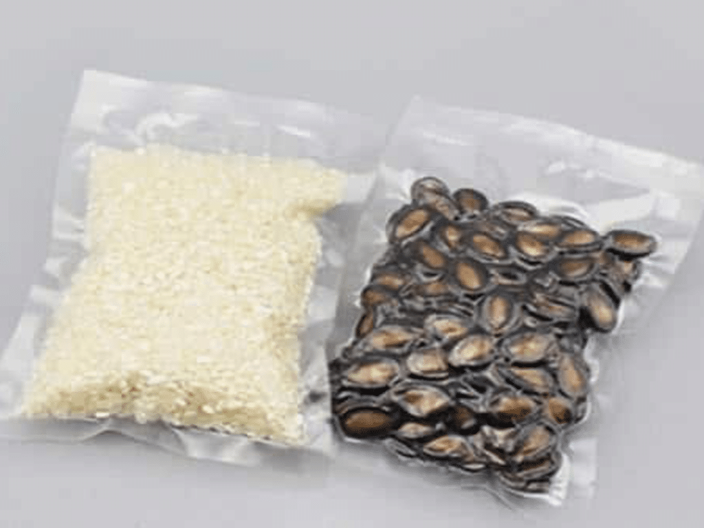 Small vacuum sealed bags containing nuts and raw rice