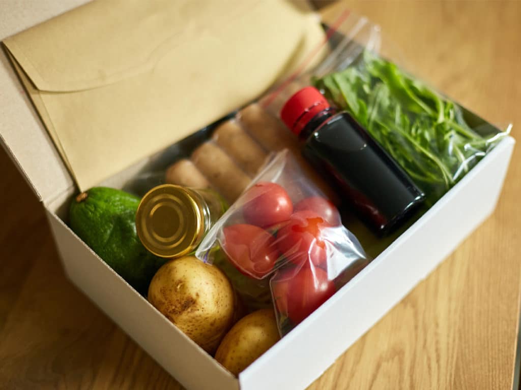 A meal delivery subscription box full of fruits and veggies