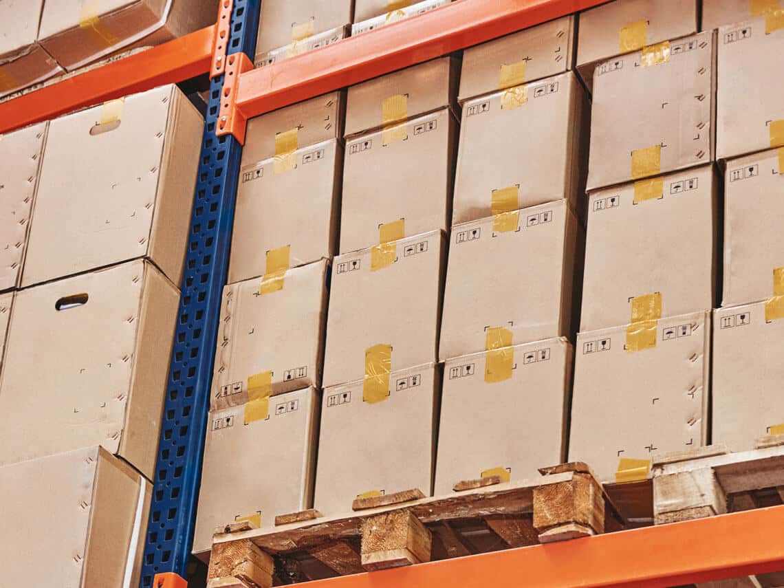 OEM packaging design boxes stacked in distribution warehouse